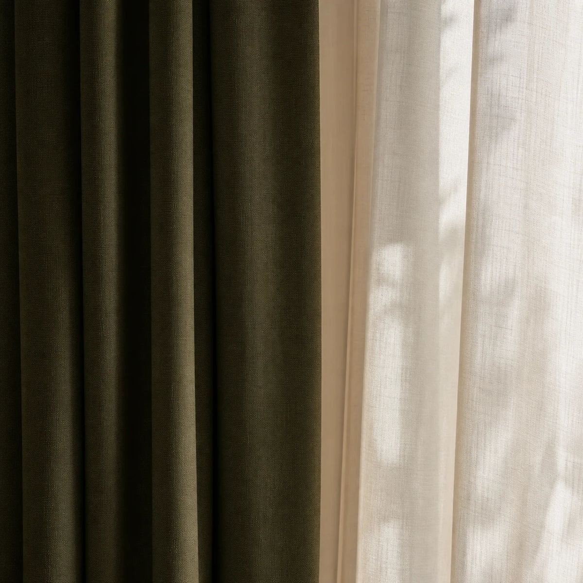 Olive curtains softly filtering bedroom light